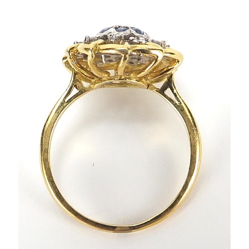 320 - 18ct gold diamond and sapphire cocktail ring, size Q, 5.2g