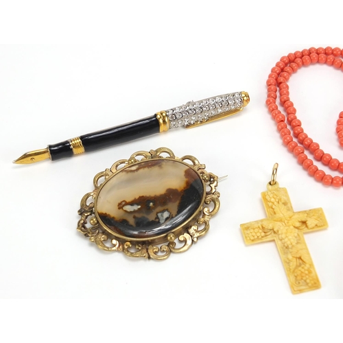 2070 - Antique and later jewellery including a carved ivory cross pendant, large agate brooch and coral nec... 