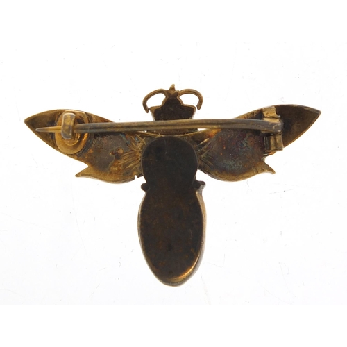 833 - Antique gold coloured metal garnet fly brooch, 3.5cm wide, 4.1g