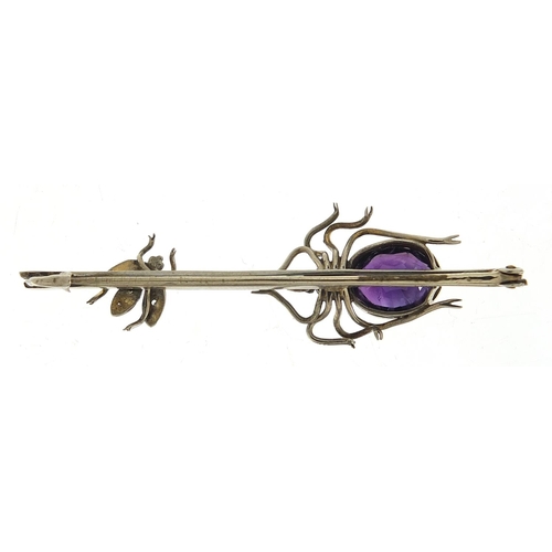 182 - Unmarked white metal spider and fly bar brooch set with purple and clear stones, 6cm wide, 4.1g