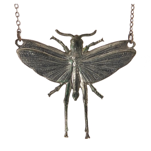 2543 - Silver coloured metal and enamel insect necklace, 40cm in length, 2.5g