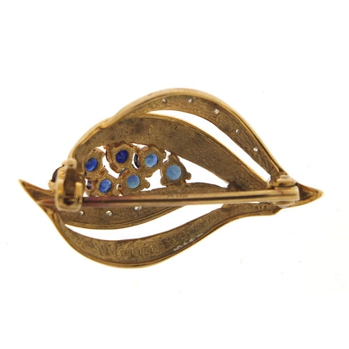 184 - 9ct gold sapphire and diamond brooch, 3cm wide, 4.0g