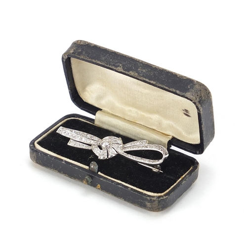 698 - Good unmarked white gold diamond bow brooch, 5cm wide, 5.7g