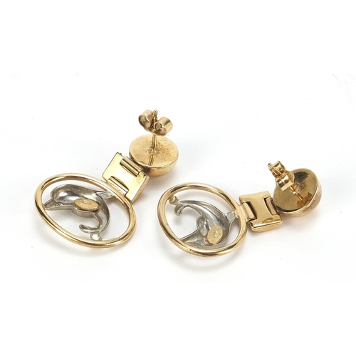 95 - Pair of 9ct gold two tone dolphin earrings, 3.4cm high, 6.4g