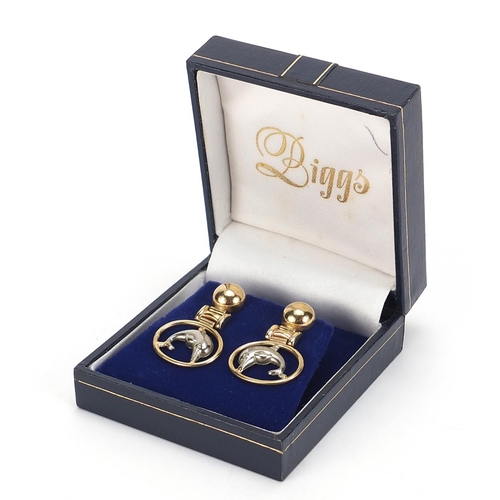 95 - Pair of 9ct gold two tone dolphin earrings, 3.4cm high, 6.4g