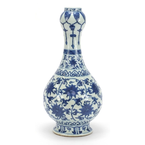 370 - Chinese blue and white porcelain garlic head vase hand painted with flower heads amongst scrolling f... 