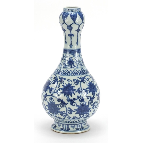 370 - Chinese blue and white porcelain garlic head vase hand painted with flower heads amongst scrolling f... 