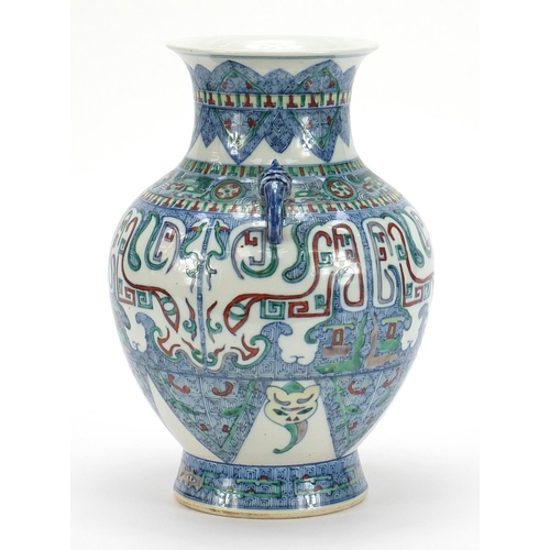 21 - Chinese doucai porcelain vase with handles, hand painted with mythical faces and heads, six figure c... 