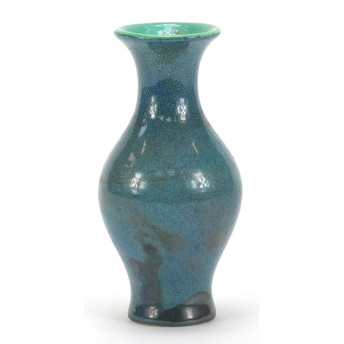 164 - Chinese porcelain baluster vase having a spotted turquoise glaze, 13cm high