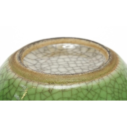 377 - Chinese porcelain crackle glazed double gourd vase having a green monochrome glaze, 15cm high