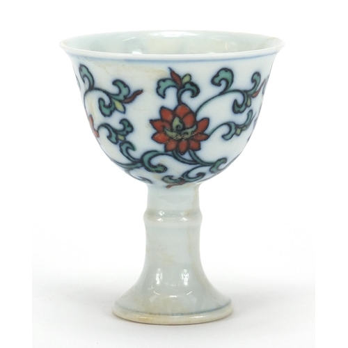 751 - Chinese doucai porcelain stem cup hand painted with flowers and foliage, six figure character marks ... 