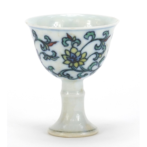 751 - Chinese doucai porcelain stem cup hand painted with flowers and foliage, six figure character marks ... 