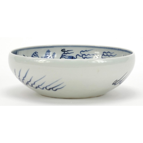 442 - Chinese blue and white porcelain bowl hand painted with a dragon amongst clouds above waves, blue ri... 