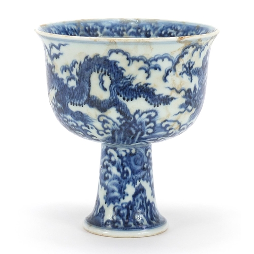 376 - Chinese blue and white porcelain stem bowl hand painted with two dragons amongst waves, four figure ... 