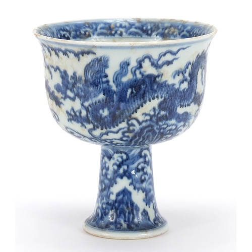 376 - Chinese blue and white porcelain stem bowl hand painted with two dragons amongst waves, four figure ... 