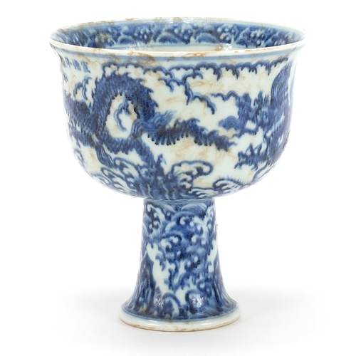 376 - Chinese blue and white porcelain stem bowl hand painted with two dragons amongst waves, four figure ... 