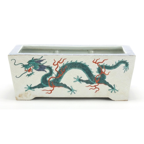 643 - Good Chinese porcelain planter finely hand painted in the famille rose palette with two dragons chas... 