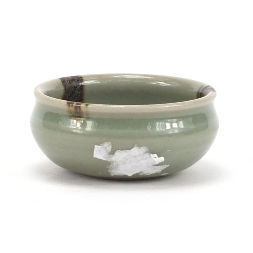 254 - Chinese porcelain bowl having a celadon glaze, 7cm in diameter