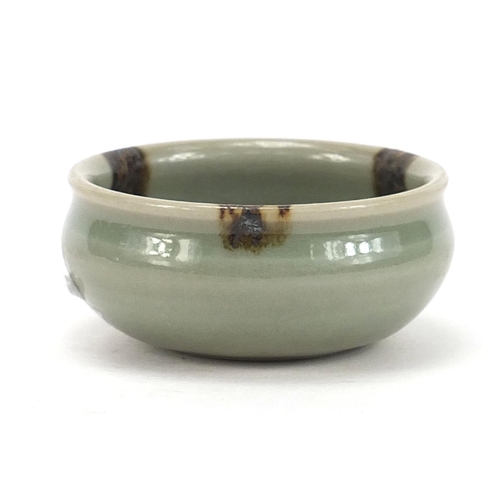 254 - Chinese porcelain bowl having a celadon glaze, 7cm in diameter