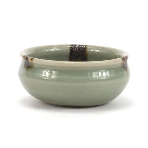 254 - Chinese porcelain bowl having a celadon glaze, 7cm in diameter