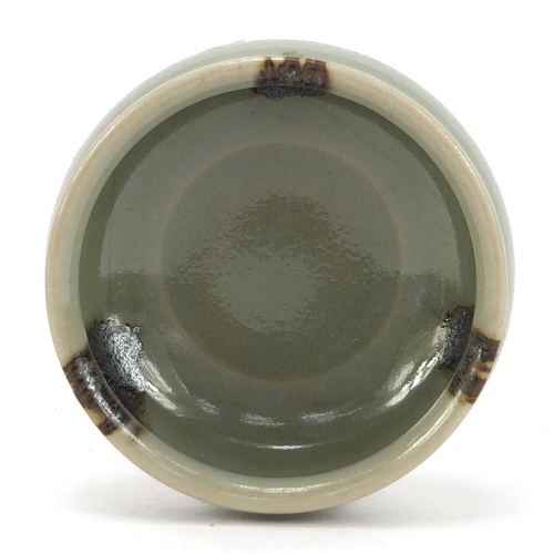 254 - Chinese porcelain bowl having a celadon glaze, 7cm in diameter