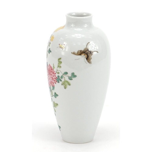 22 - Chinese porcelain vase finely hand painted in the famille rose palette with butterflies amongst flow... 