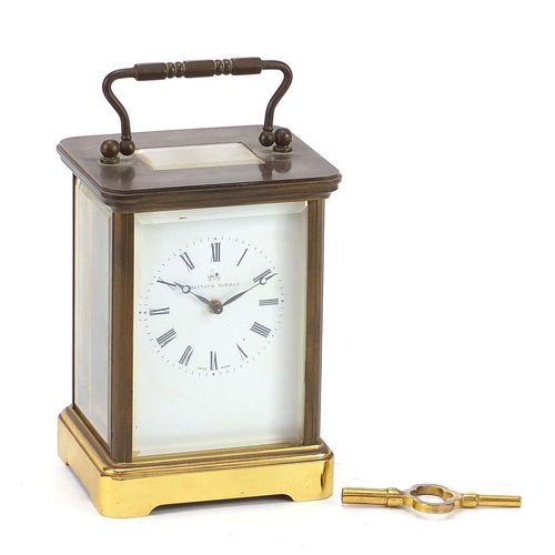 79 - Matthew Norman, large brass cased carriage clock with Roman numerals, numbered 1752 to the backplate... 