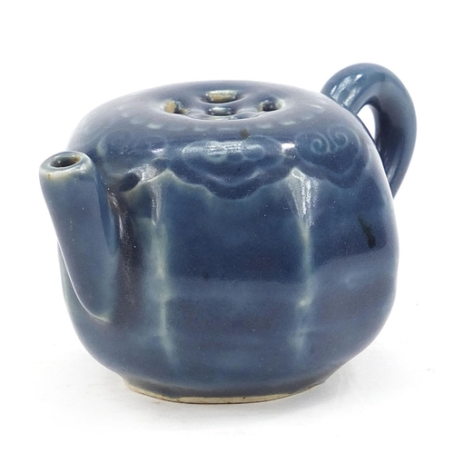 2109 - Chinese porcelain blue glazed water pot with ruyi head border, 8cm in length