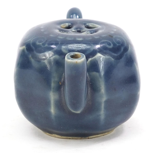 2109 - Chinese porcelain blue glazed water pot with ruyi head border, 8cm in length