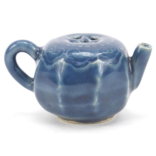 2109 - Chinese porcelain blue glazed water pot with ruyi head border, 8cm in length