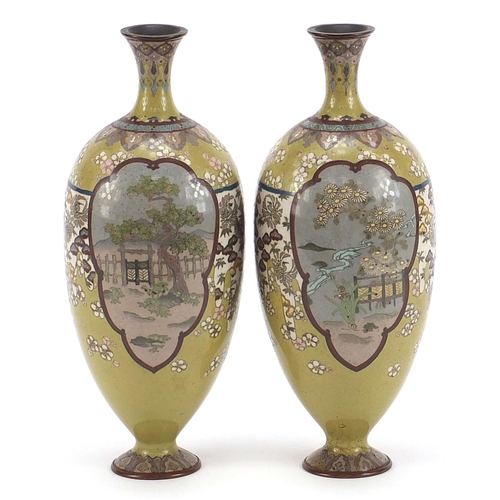 62 - Good pair of Japanese cloisonné vases finely enamelled with landscapes and flowers, each 24.5cm high