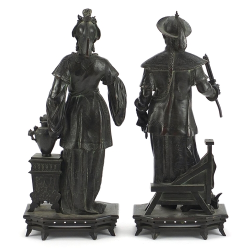 600 - Wilhelm, pair of 19th century patinated bronze figures of a Chinese gentleman and female, the larges... 