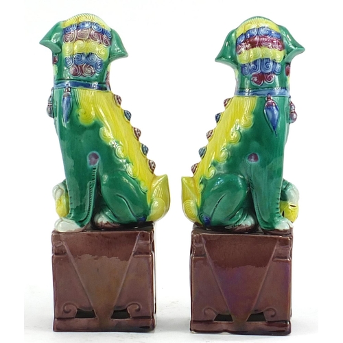 639 - Pair of Chinese porcelain Foo dogs, each 26cm high