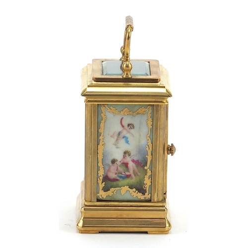 614 - Miniature brass perpetual carriage clock with Sevres type porcelain panels, 7.5cm high