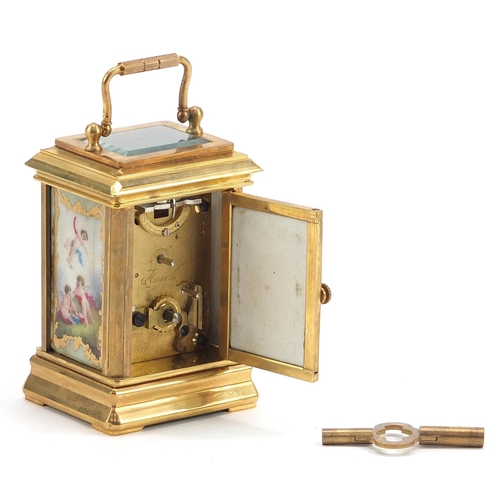 614 - Miniature brass perpetual carriage clock with Sevres type porcelain panels, 7.5cm high