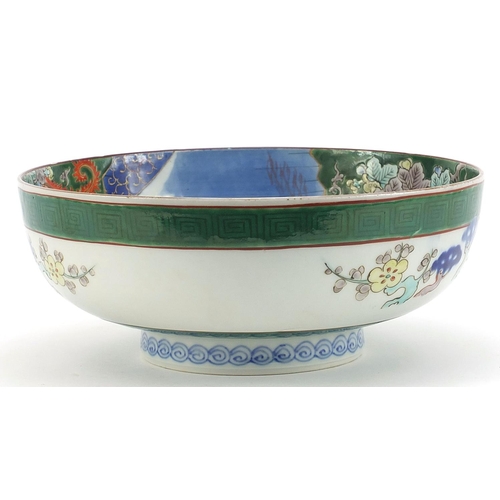 642 - Japanese porcelain bowl hand painted with a dragon amongst clouds, character marks to the underside,... 