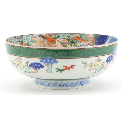 642 - Japanese porcelain bowl hand painted with a dragon amongst clouds, character marks to the underside,... 