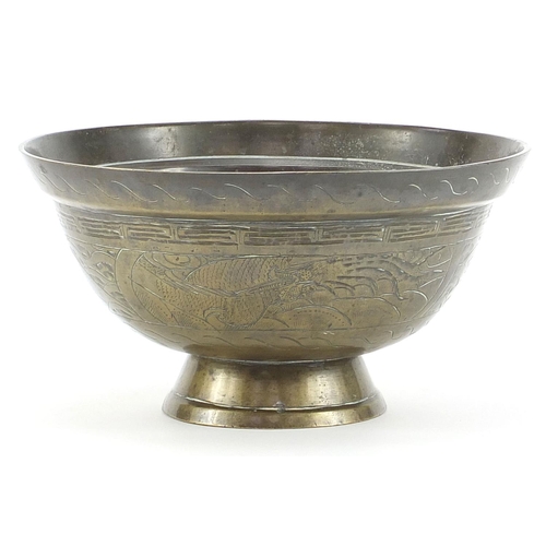 1936 - Chinese bronze dragon bowl, six figure character marks to the base, 13.5cm high x 25.5cm in diameter