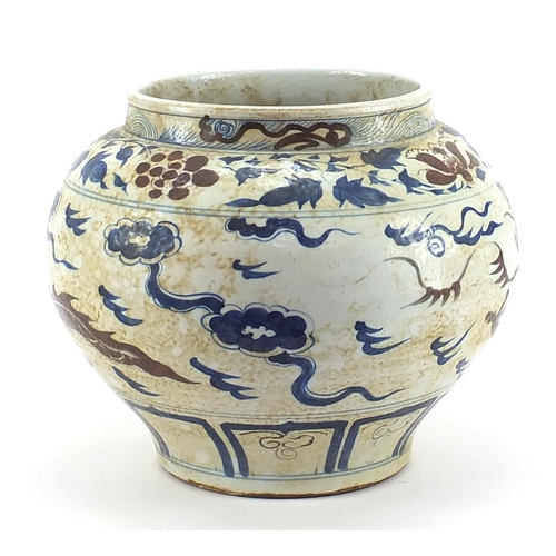 738 - Large Chinese porcelain temple jar hand painted with a dragon amongst clouds, 30cm high