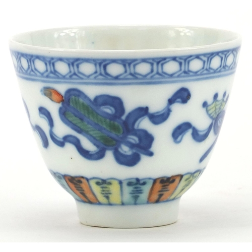 1842 - Chinese porcelain tea bowl decorated with Daoist emblems, six figure character marks to the base, 6c... 
