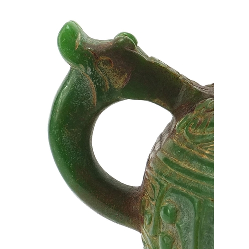 755 - Chinese archaic style carved green jade vase with twin dragon handles, 17.5cm high