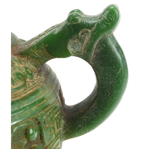 755 - Chinese archaic style carved green jade vase with twin dragon handles, 17.5cm high