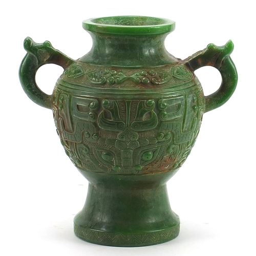 755 - Chinese archaic style carved green jade vase with twin dragon handles, 17.5cm high