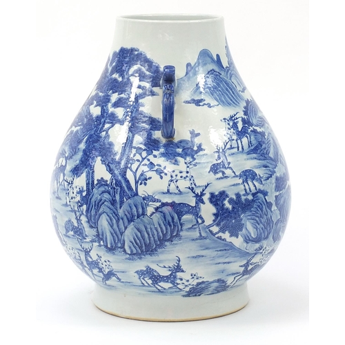 369 - Very large Chinese blue and white porcelain arrow vase with ears, finely hand painted with deer in a... 