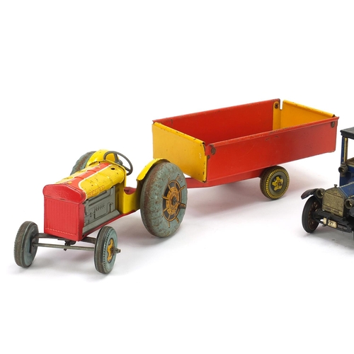 921 - Antique and later tinplate toys comprising a Schuco Ford Coupet 1917, Chad Valley Harborme car and a... 