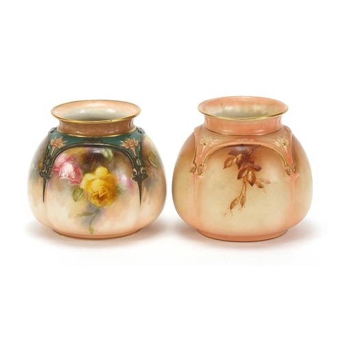 410 - Two Hadley's Worcester blush ivory vases hand painted with flowers, each 8cm high