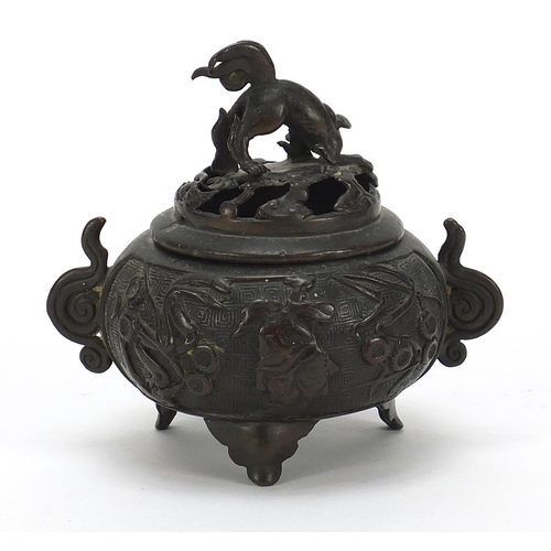 756 - Chinese patinated bronze tripod incense burner with twin handles, 12cm high