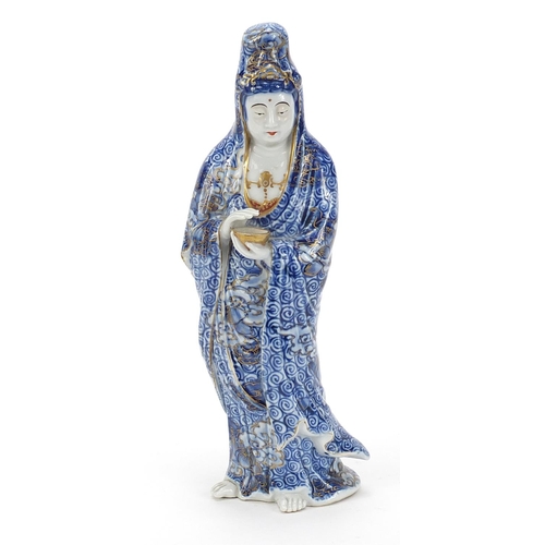 1858 - Japanese porcelain figure of a female holding a bowl, 26.5cm high