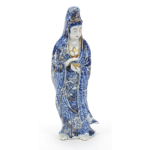 1858 - Japanese porcelain figure of a female holding a bowl, 26.5cm high