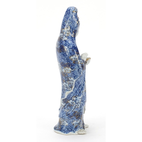 1858 - Japanese porcelain figure of a female holding a bowl, 26.5cm high